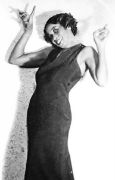 Lil poses in gown, standing
